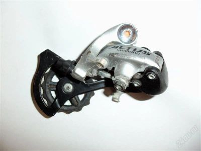 Лот: 1091693. Фото: 1. Задний переключатель SHIMANO ALTUS. Запчасти