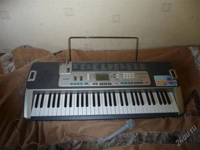 Лот: 840040. Фото: 1. Синтезатор Casio LK-215. Клавишные