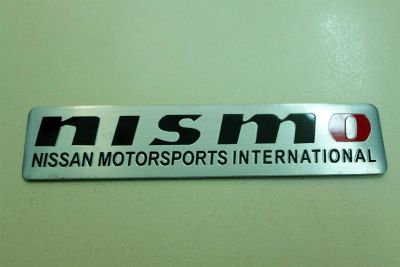 Лот: 3243953. Фото: 1. Алюминиевый шильдик Nismo самоклеющийся. Другое (оснащение, оборудование, аксессуары)