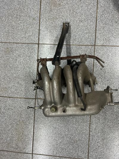 Лот: 25079359. Фото: 1. Коллектор впускной 7A-FE. Двигатель и элементы двигателя