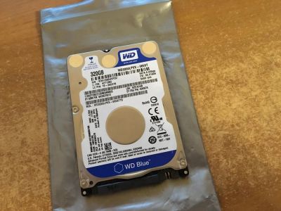 Лот: 9984960. Фото: 1. Жесткий диск 320Gb 2.5" WD wd3200lpvx. Жёсткие диски (HDD)