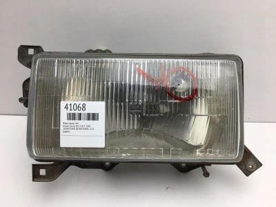 Лот: 20390001. Фото: 1. Фара Nissan Sunny 1983 2606035A00... Оптика и освещение