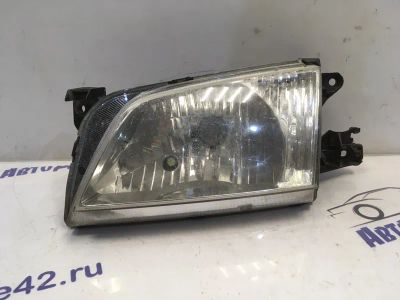 Лот: 21710684. Фото: 1. фара Mazda Demio DW3W. Двигатель и элементы двигателя