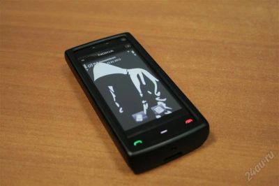 Лот: 1502464. Фото: 1. Nokia X6 8Gb Black + черный чехол. Смартфоны