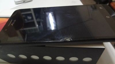 Лот: 10830396. Фото: 1. Смартфон Asus ZC500TG с коробкой... Смартфоны