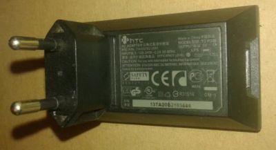 Лот: 17392415. Фото: 1. Сетевой адаптер HTC TC P300, p... Зарядные устройства, блоки питания, адаптеры сетевые для смартфонов