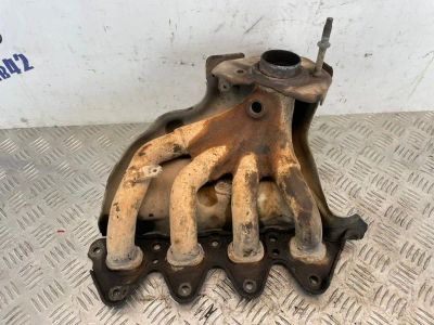 Лот: 24809655. Фото: 1. коллектор выпускной Nissan Almera... Двигатель и элементы двигателя