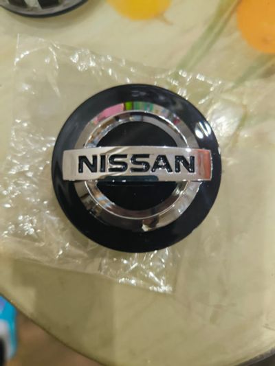 Лот: 25257724. Фото: 1. Заглушка диска Nissan. Другое (шины, диски)