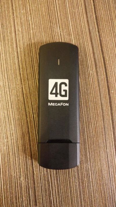 Лот: 10985375. Фото: 1. USB-модем Мегафон 4G+ (M100-4). Беспроводные модемы