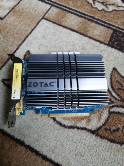 Лот: 14066204. Фото: 1. Видеокарта ZOTAC GT220 1GB 128BIT. Видеокарты