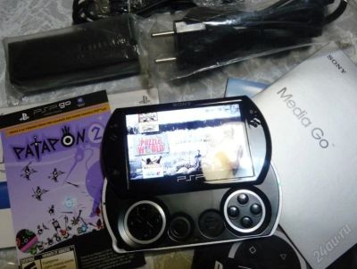 Лот: 1475176. Фото: 1. psp go! черная, 16гб с играми... Игровые приставки, консоли