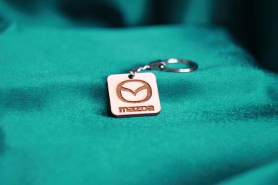 Лот: 8907485. Фото: 1. Деревянный брелок Mazda. Брелоки для ключей