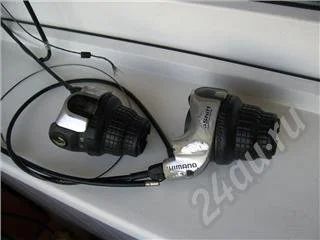 Лот: 425338. Фото: 1. Две манетки-грипшифт Shimano SL-RS41-7A... Запчасти