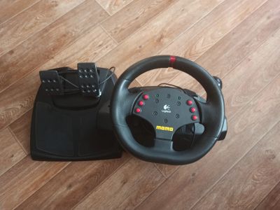 Лот: 15425635. Фото: 1. Игровой руль Logitech momo. Рули, джойстики