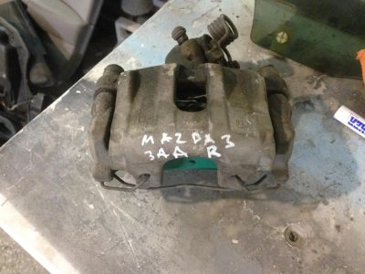 Лот: 5255386. Фото: 1. Суппорт задний правый Mazda 3... Тормозная система