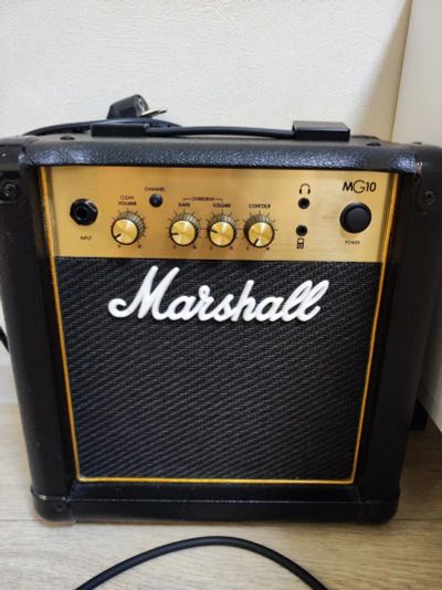 Лот: 19676539. Фото: 1. Комбоусилитель Marshall MG10G. Гитарные эффекты и комбоусилители