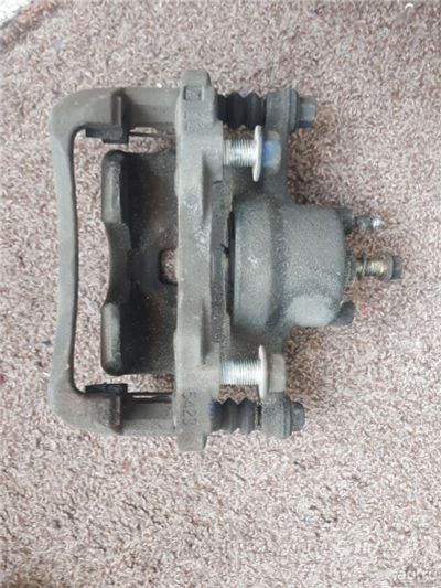 Лот: 11199743. Фото: 1. Тормозной суппорт Nissan Cube... Тормозная система