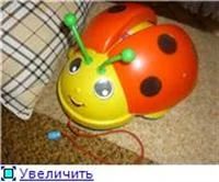 Лот: 3118652. Фото: 1. Каталка "Божья коровка". Развивающие