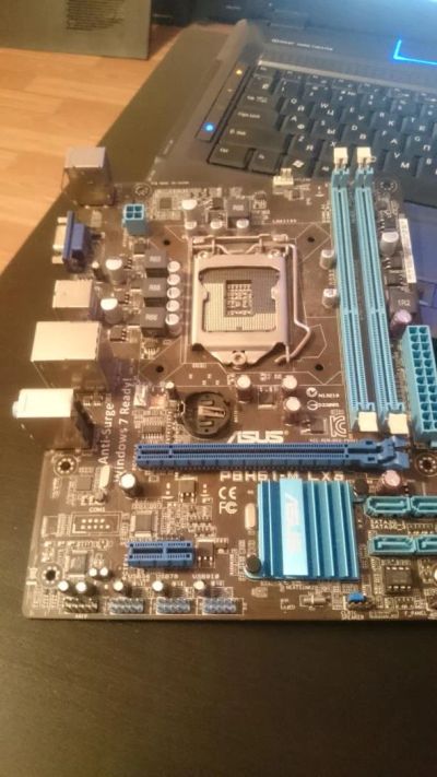 Лот: 8167932. Фото: 1. ASUS P8H61-M LX3 не стартует. Материнские платы