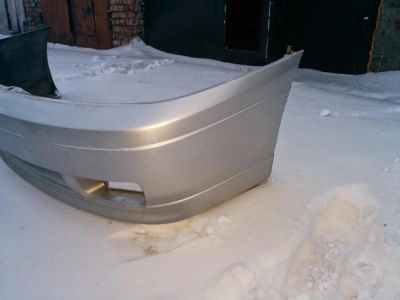Лот: 4787284. Фото: 1. Передний бампер Nissan Bluebird... Кузов
