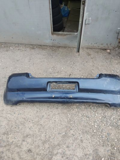 Лот: 25630879. Фото: 1. Бампер Toyota Vitz 2004 SCP10... Кузов