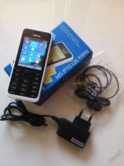 Лот: 5832930. Фото: 1. Nokia 301 белый (2 сим-карты). Кнопочные мобильные телефоны