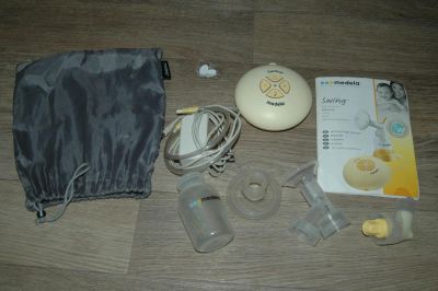 Лот: 5397217. Фото: 1. Молокоотсос Medela Swing + полезный... Всё для кормления