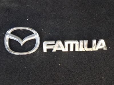 Лот: 11772623. Фото: 1. Шильдик крышки багажника Mazda... Кузов