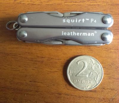 Лот: 5829756. Фото: 1. Leatherman Squirt P4 (серый) мини-мультитул... Фонарики