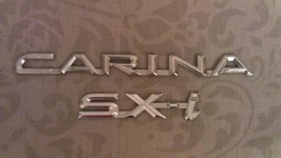 Лот: 10718043. Фото: 1. Toyota Carina SX-I - шильдик... Кузов