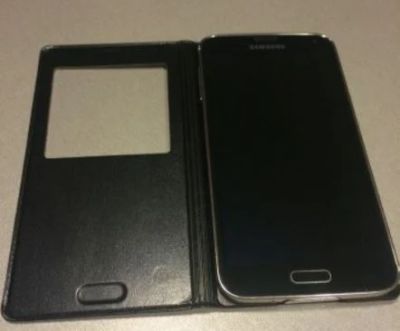 Лот: 6597247. Фото: 1. Новый galaxy s5 черный, LTE. Смартфоны