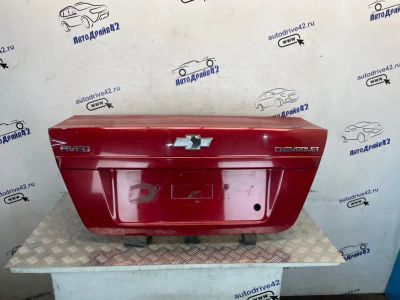 Лот: 25788222. Фото: 1. крышка багажника Chevrolet Aveo... Двигатель и элементы двигателя