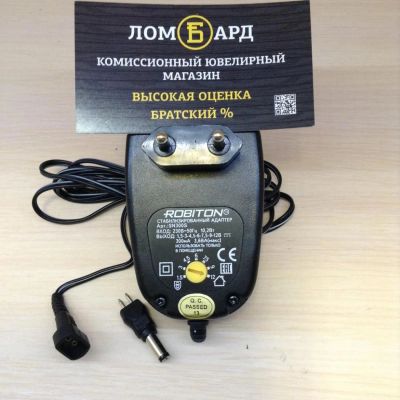 Лот: 10926623. Фото: 1. Универсальный стабилизированный... Зарядные устройства, блоки питания для бытовой техники