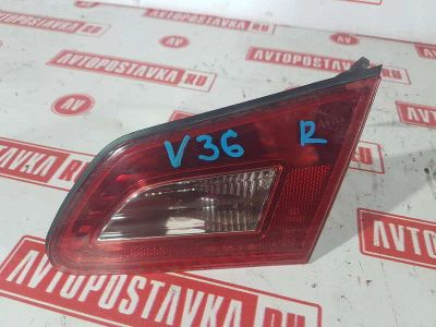 Лот: 20898544. Фото: 1. Фонарь крышки багажника Nissan... Двигатель и элементы двигателя