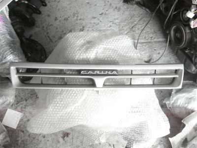 Лот: 2100879. Фото: 1. Решетка радиатора Toyota carina... Кузов