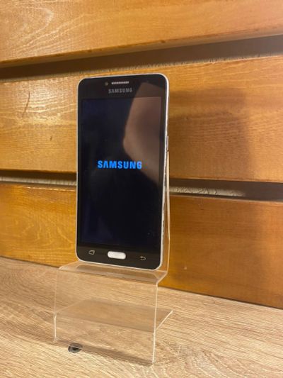 Лот: 19384530. Фото: 1. Смартфон Samsung J2 Prim (1065... Смартфоны