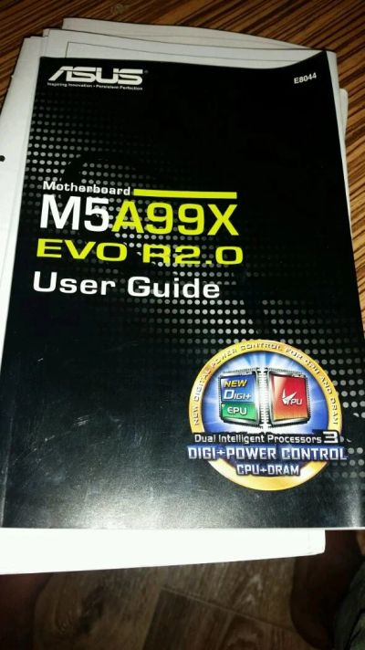 Лот: 13997022. Фото: 1. Инструкция и диск от ASUS M5A99X... Материнские платы