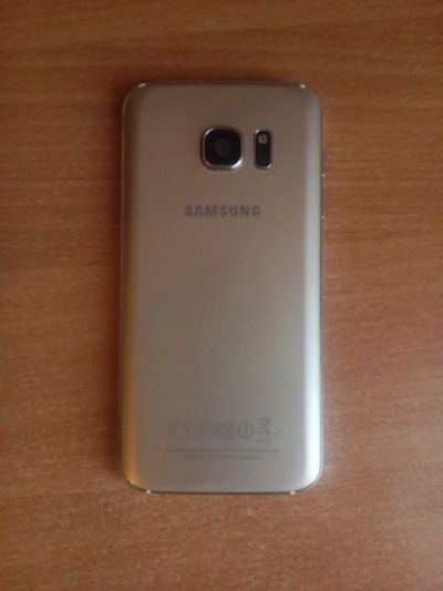 Лот: 15826718. Фото: 1. Телефон Samsung S7 на 64 gb (торг... Смартфоны