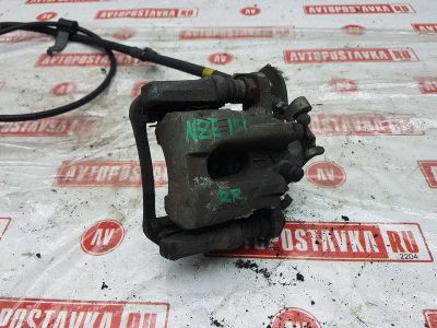 Лот: 20901242. Фото: 1. Суппорт тормозной Toyota Corolla... Тормозная система