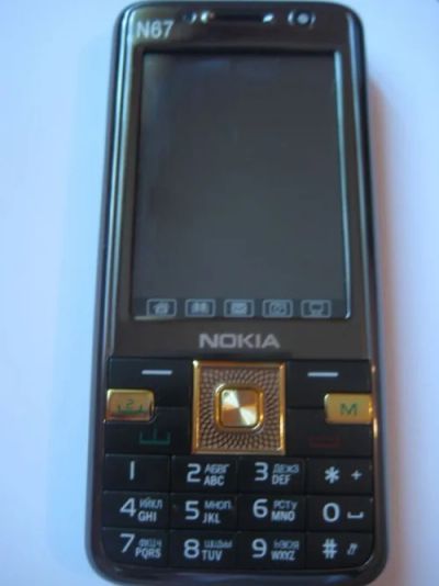 Лот: 3439798. Фото: 1. nokia N67 (повторные торги ). Кнопочные мобильные телефоны