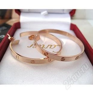 Лот: 1445001. Фото: 1. Серьги Cartier. 14 К напыление... Серьги, каффы