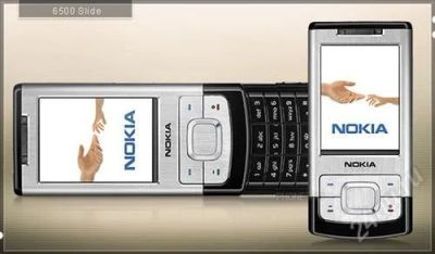 Лот: 946188. Фото: 1. Nokia 6500 Slide SIlver MOD. Кнопочные мобильные телефоны