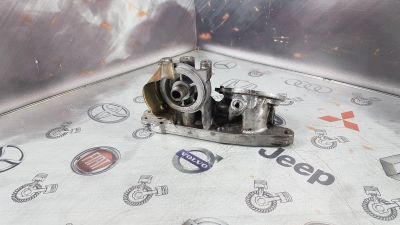 Лот: 23588106. Фото: 1. Кронштейн масляного фильтра Mazda... Расходные материалы
