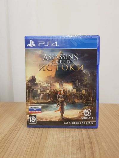Лот: 15818834. Фото: 1. Assassins Creed Истоки PS4 Новый... Игры для консолей