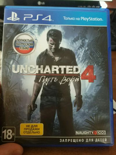 Лот: 9668399. Фото: 1. Продам Диск Uncharted 4 PS4 полностью... Игры для консолей
