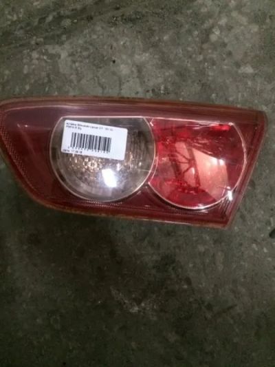 Лот: 21420004. Фото: 1. вставка багажника Mitsubishi Lancer... Двигатель и элементы двигателя