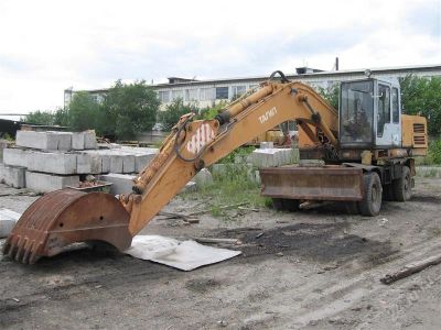 Лот: 1102749. Фото: 1. Продам Экскаватор колесный ЭО-33211. Грузовики, автобусы, спецтехника