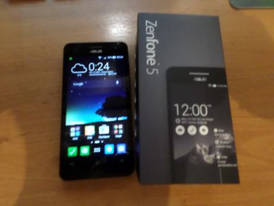 Лот: 4894300. Фото: 1. Asus ZenFone A501CG 5" 16Gb Black. Смартфоны