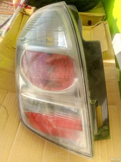 Лот: 13857183. Фото: 1. Фонарь задний левый toyota ractis. Оптика и освещение