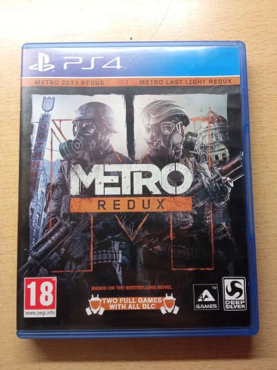 Лот: 21055956. Фото: 1. Диск Metro redux Playstation 4... Игры для консолей